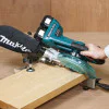 Акумулаторен настолен циркуляр с герунг и изтегляне за дърво Makita DLS714Z DLS714Z